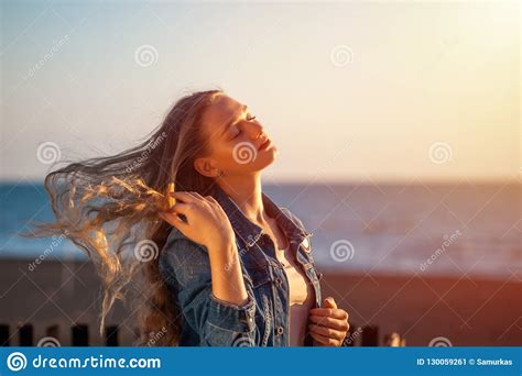 Beautiful Woman On The Beach Enjoying Fresh Air Freedom On Sunset Stock Image Image Of Freedom