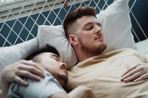 Two Men Cuddling In Bed · Free Stock Photo