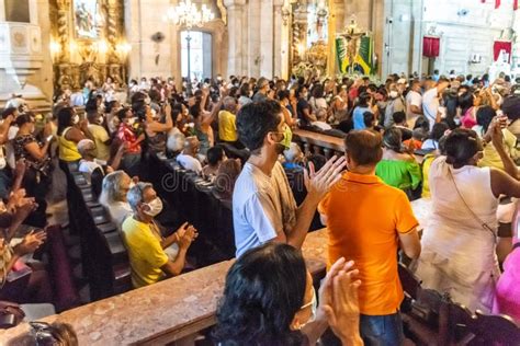 catholic faithful are praying during tributes to nossa senhora da conceicao da praia editorial