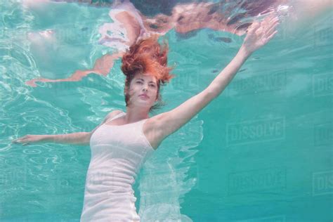 Women In Swimming Pool In The Dress Play Woman Underwater Tank Min