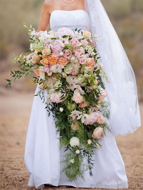 Cascading Wedding Bouquets That Prove Bigger Is Better Cascading Bridal Bouquets Cascading