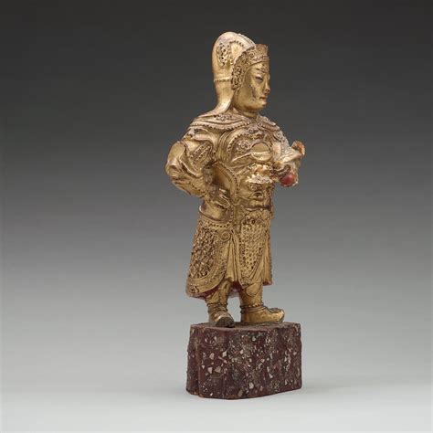 A Wood Sculpture Of A Guardian Figure 1644 1912 Bukowskis
