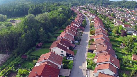 Curved Street With Suburban Houses From Aerial Flying Over Suburban Houses Neighborhood At