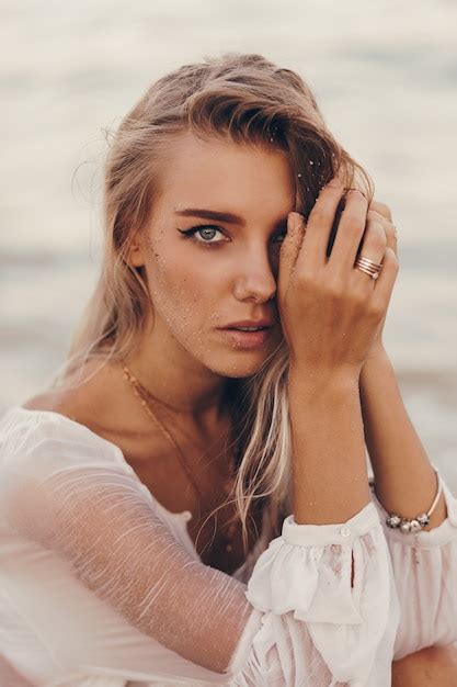 Free Photo Outdoor Summer Portrait Of Beautiful Happy Blond Woman Chilling On The Beach Near Ocean