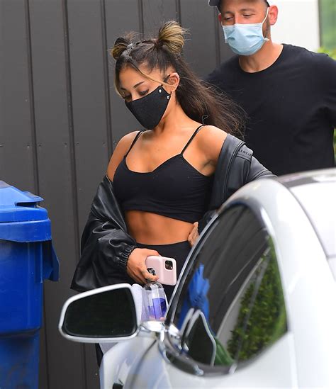 Ariana Grande Shows Off Her Toned Abs And Pokies After An Intense