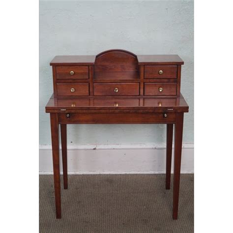 Rich and lustrious or bright and cheerful, a cherry wood writing desk is a refined addition to any professional environment. Pennsylvania House Solid Cherry Small Writing Desk | Chairish