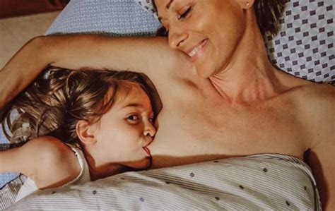 Mum Pictured Breastfeeding Her Six Year Old Daughter As Photographer