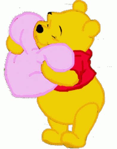 Winnie The Pooh Holding A Pink Heart