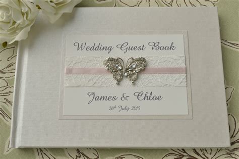 • (1) book album cover design in three sizes: Diamante Butterfly Wedding Guest Book. Luxury Pearlescent Ivory Book Cover - Creative Bridal