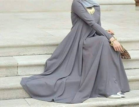 A long, flowing garment that covers the whole body from head to feet, the burka. Pakistani Arabic Burka Design - Burqa Online In India ...