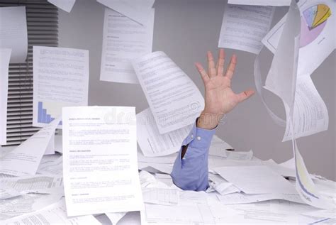 Business Man Drowning In A Desk Full Of Papers Stock Photo Image Of