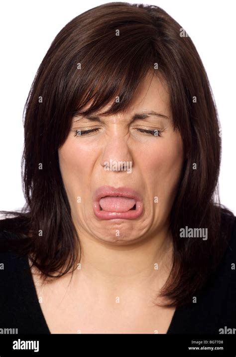Woman With A Nasty Taste In Her Mouth Pulling A Face Stock Photo Alamy