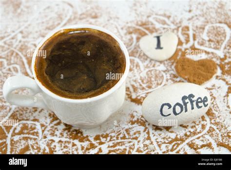 White Cup Of Coffee And Rocks Saying I Love Coffee Stock Photo Alamy