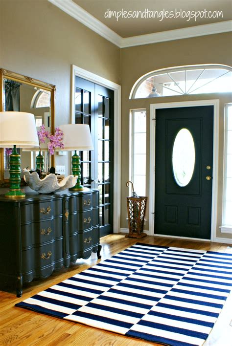 Home entry with vintage barn door, vintage rug and dresser and modern elements. NEW RUG FOR THE ENTRY - Dimples and Tangles