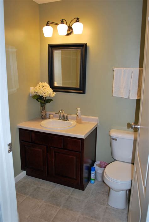 The style, constructed of solid hardwood, has two functional drawers and a porcelain sink and countertop with space for bathroom essentials. Well-liked Square Dark Wood Wall Mount Mirror Over Small 2 ...
