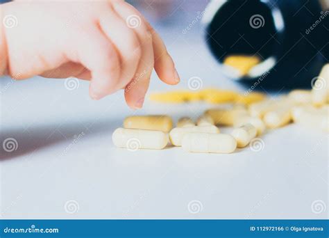 Child Hand Taking A Pill Stock Photo Image Of Care 112972166