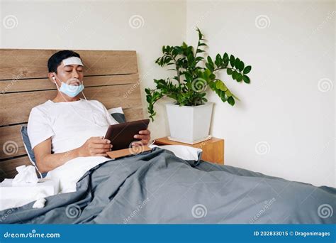 Sick Man Lying In Bed Stock Image Image Of Relaxation 202833015