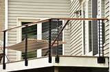 The entire system is completely code compliant. Deck with Cable Railing System - Lockport, NY - Keuka Studios