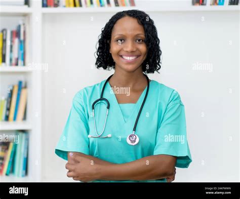 Laughing African American Mature Nurse At Hospital Stock Photo Alamy