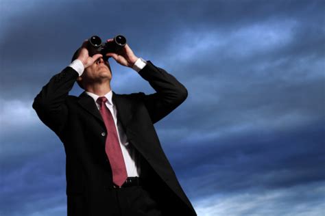 Businessman Looking Through Binoculars Stock Photo Download Image Now