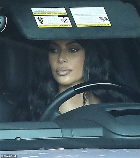 Kim Kardashian Shows Off Her Pout Behind The Wheel Of Suv After