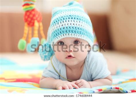 Little Child Lying On Childrens Rug Stock Photo Edit Now 174608444