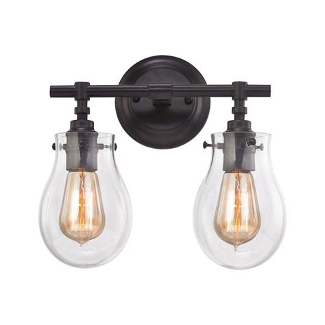 This vanity light takes two 60w bulbs, so go and pick some up at your local hardware store. Jaelyn 2-Light Oil Rubbed Bronze Vanity Light-TN-75356 ...