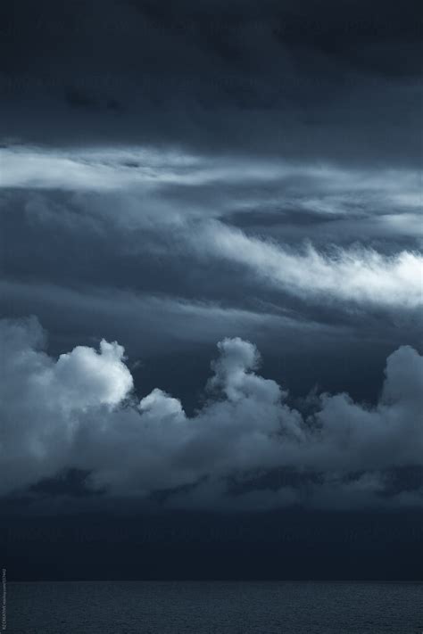 Dark Dramatic Storm Clouds Over The Open Ocean By Stocksy