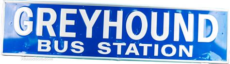 Greyhound Bus Station Embossed Tin Sign Blue W White