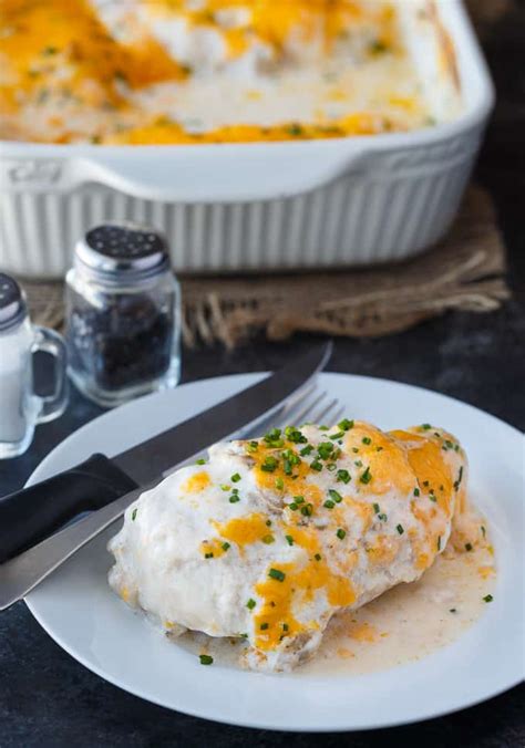 This sour cream chicken is made with a sour cream sauce smothered over chicken breasts, topped with parmesan cheese and baked in the oven!. Sour Cream Chicken Bake - Simply Stacie