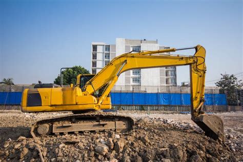 Yellow Backhoe Loader On Construction Site And Work Stock Image Image