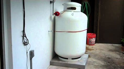 7.5 gallons per minute water flow rate. Propane tank and outdoor tankless water heater ...