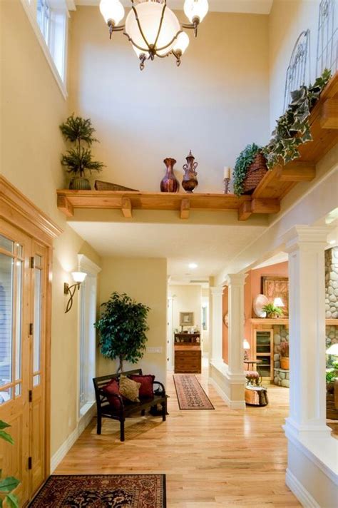 By making the most of unused wall surface area, shelves provide extra storage. 46 Beautiful Entrance Hall Designs and Ideas (Pictures ...