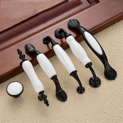 Get a handle on style. 4pcs Country Style Door Handles Black White Ceramics ...
