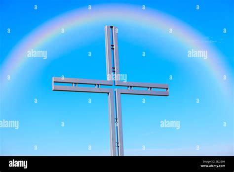 Rainbow And Religious Cross Symbol Of Christianity Stock Photo Alamy