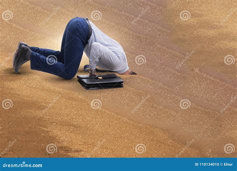 The Businessman Hiding His Head In Sand Escaping From Problems Stock