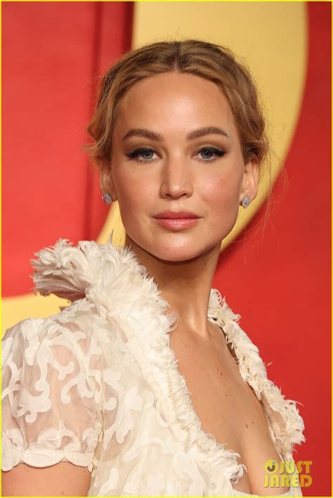 Jennifer Lawrence Goes Sheer Wears Vintage Dress With Long Train To