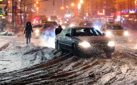 Snowstorm Slams New York City As Schools Close Hundreds Of Flights Are