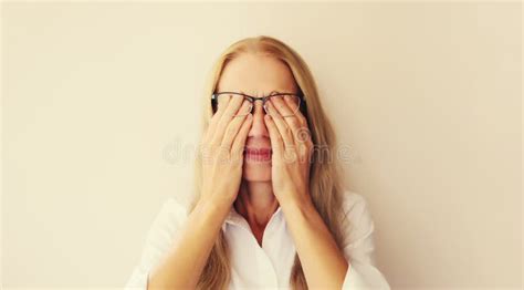 Tired Overworked Middle Aged Woman Employee Rubbing Her Eyes Suffering