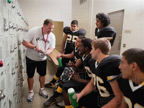 Coach Talking To Football Players In Locker Room Stock Photo Dissolve