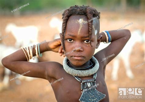 Young Himba Girl With Ethnic Hairstyle Epupa Namibia Stock Photo