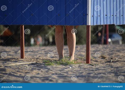 Dressing Room On The Beach Girl S Legs Are Visible From The Dressing Room Stock Photo Image