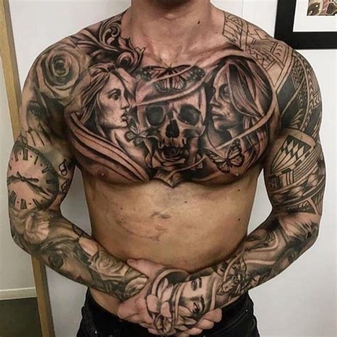 A Man With Many Tattoos On His Chest