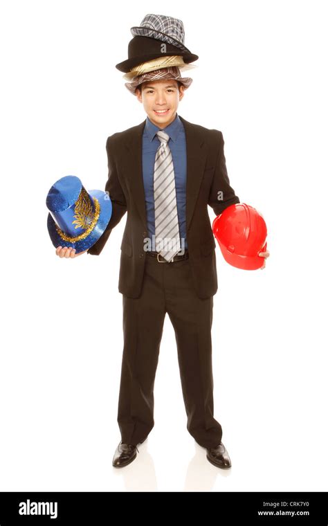 A Businessman Wearing And Holding Many Hats Iisolated On White For Alamy Only Stock Photo Alamy