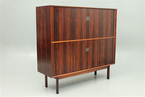 3.8 out of 5 stars. Double roll front cabinet in rosewood designed by Arne ...