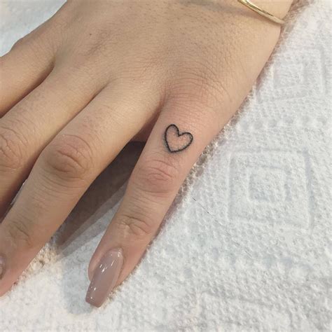𝒦 𝐼 𝒳 𝒳 Tiny heart tattoos Small heart tattoos Red heart tattoos