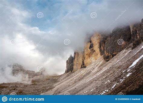 Incredible View Of The Three Peaks Of Lavaredo In Morning Fog Stock