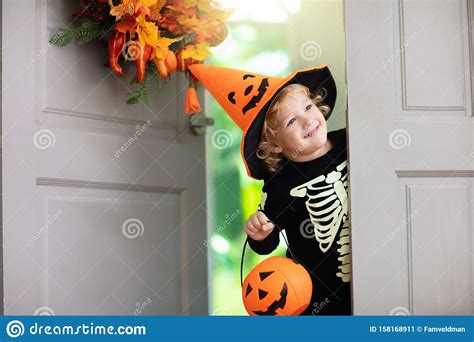 Kids Trick Or Treat Halloween Child At Door Stock Image Image Of