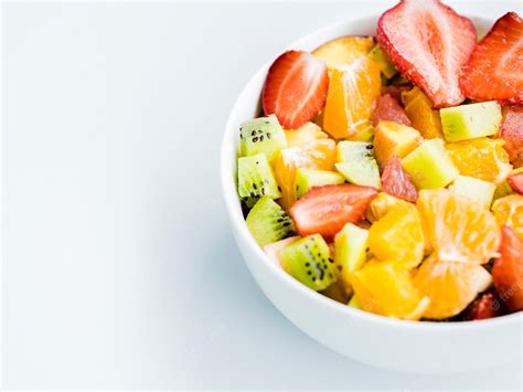 Free Photo Bowl Of Fresh Fruit Bright Salad On White Background