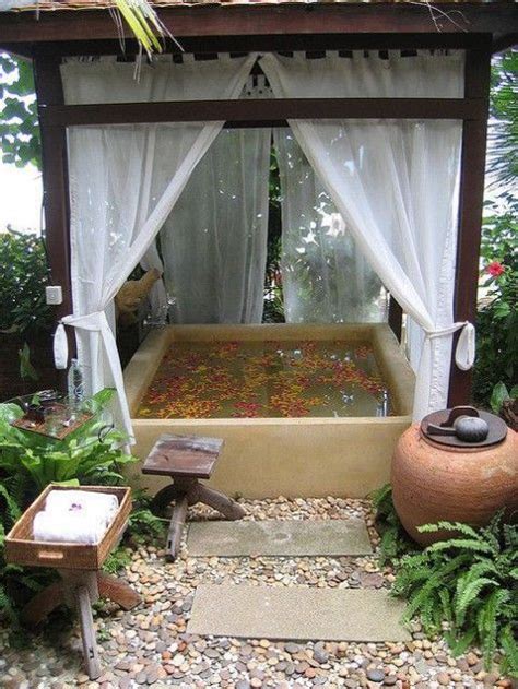 Jacuzzi is a large bath or a small pool that is equipped electrically to sprout jets of water and air bubbles from different points and give a massage. Nice Outdoor Spa & Hot Tub Design With Rock - Stylendesigns